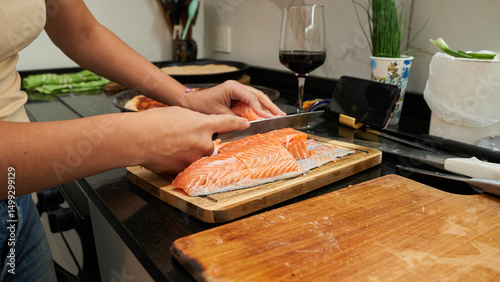 hands making fresh sushi at home