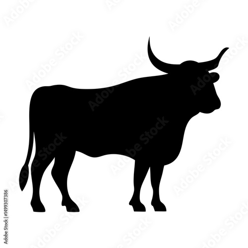 Powerful black silhouette of a horned bull standing majestically on white