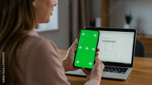 Woman Holding Green Screen Phone with Laptop | Home Office Interior