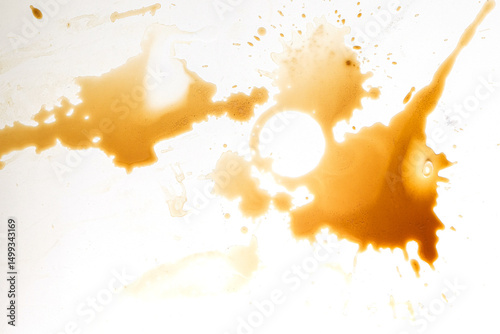 glass of liquid coffee accidentally spill on the surface, leaving behind dirty stain and textured background unplanned everyday moment in motion.