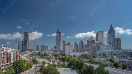 Downtown atlanta skyline with modern skyscrapers, luxury hotels and corporate towers under clear blue georgia sky