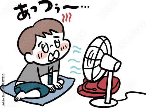 扇風機の風に当たる男の子