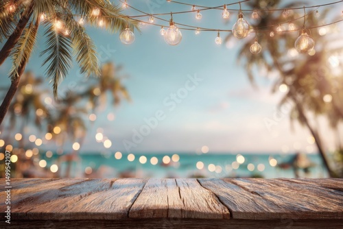 Fototapeta Naklejka Na Ścianę i Meble -  Tropical beach party background with wooden table palm trees and string lights summer vacation concept