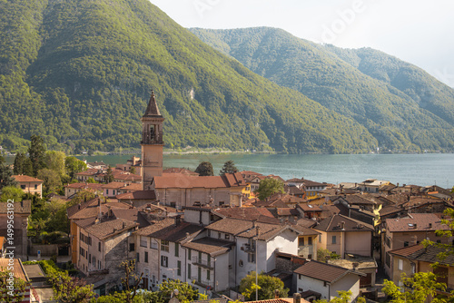 Tableau sur toile Lake small village in Porlezza in the Italian Alps of Europe