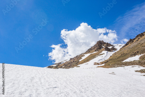 Snow-capped peaks of the Caucasus Mountains landscape. Muhu Pass, Karachay-Cherkessia, Russia