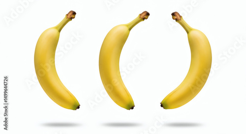 Banana Trio: Three ripe bananas showcase the simple perfection of nature's bounty, their bright yellow hues popping against a clean, understated backdrop.