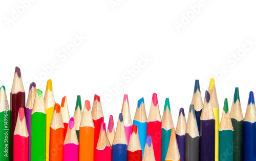 Colored wooden pencils on a white background.Colored pencils background.A set of colored pencils.