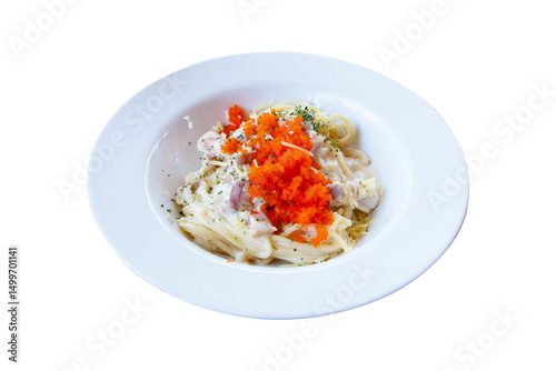 Spaghetti with shrimp with seafood salad flavor with Crab eggs and cheese on top on white plate. Noodles beautiful and delicious Italian food. Isolated on cutout PNG or transparent background.