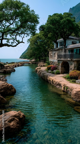 A small house and a village sit by the river, a peaceful nature landscape with reflections on the water