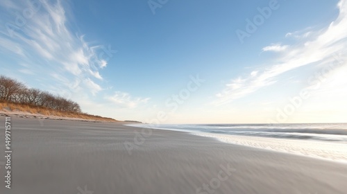 Sandy beach with winter ocean view.