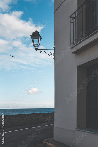 street lamp on the boulevard by the sea at evening in antibes