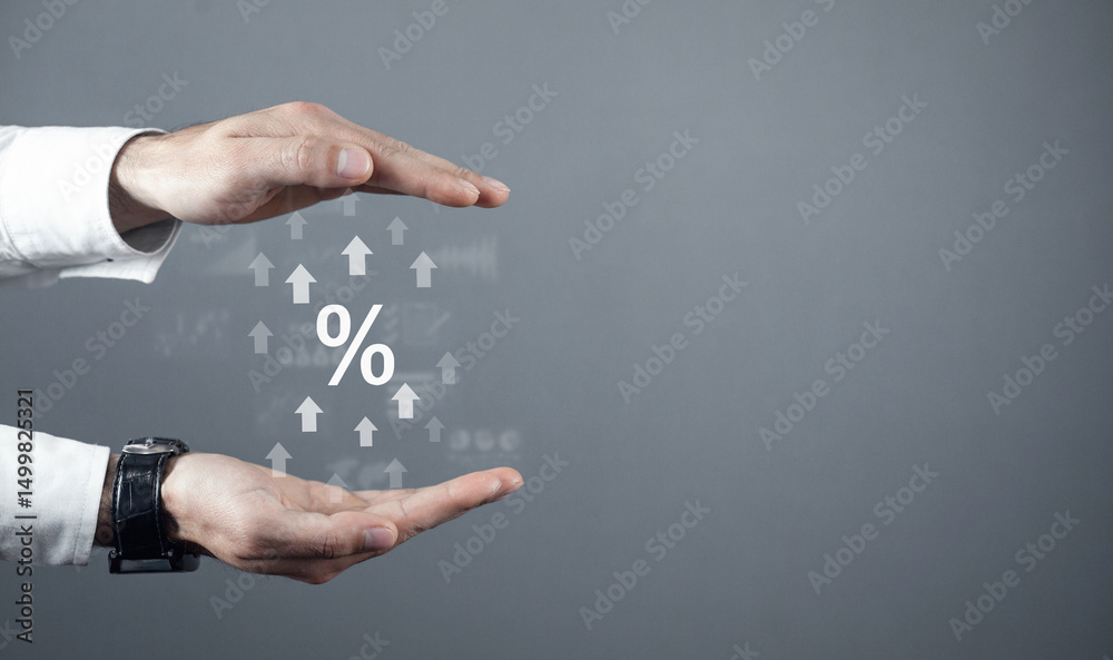 Fototapeta premium Human with a percent symbol and growing arrows. Business