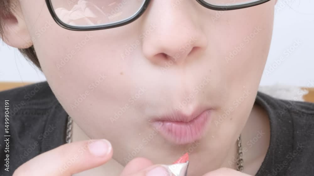 male teenager eating chocolate bar, boy 11 years old enjoys delicious chocolate bar, child eating sugary snack, unhealthy delicious sweetness, Childhood memories, sweet treat, little moments joy