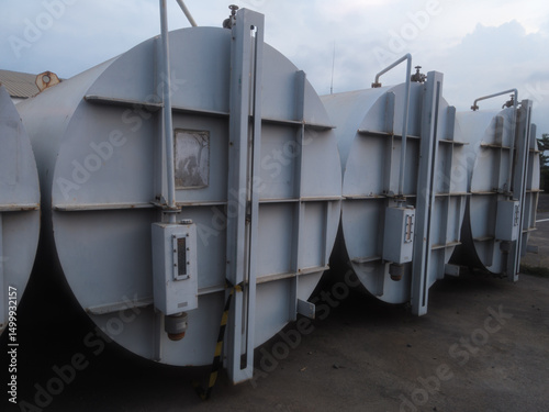 solar tank with water filter filled with silica gel, already abadoned, old, in open warehouse