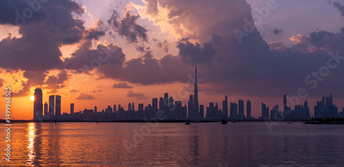 Schilderij op canvas panoramic sunset view of Dubai Downtown cityline from Dubai Creek harbour