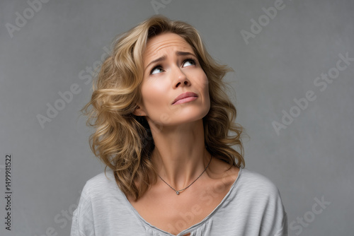 blond mid age woman looking for solution