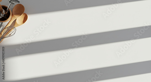 Sunlit Kitchen Utensils: A Culinary Still Life with Natural Light and Shadow