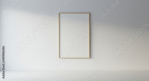 Minimalist wall mockup featuring a blank poster frame in a bright neutral room