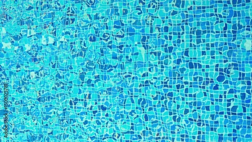 The view of swimming pool water surface at sunset, sun reflection