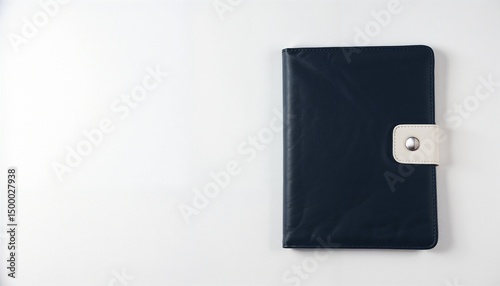 Leather notebook with a clasp on a light background with copy space