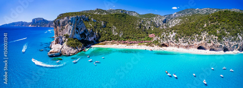 Best and most beautiful beaches of Sardegna island (Italy) - Cala Luna in gulf of Orosei a spectacular national park, Aerial panoramic drone view of white sandy beaches and turquoise sea