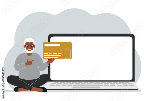 A man sits cross-legged and holds a large plastic card. Next to the man is a large laptop with space for text.