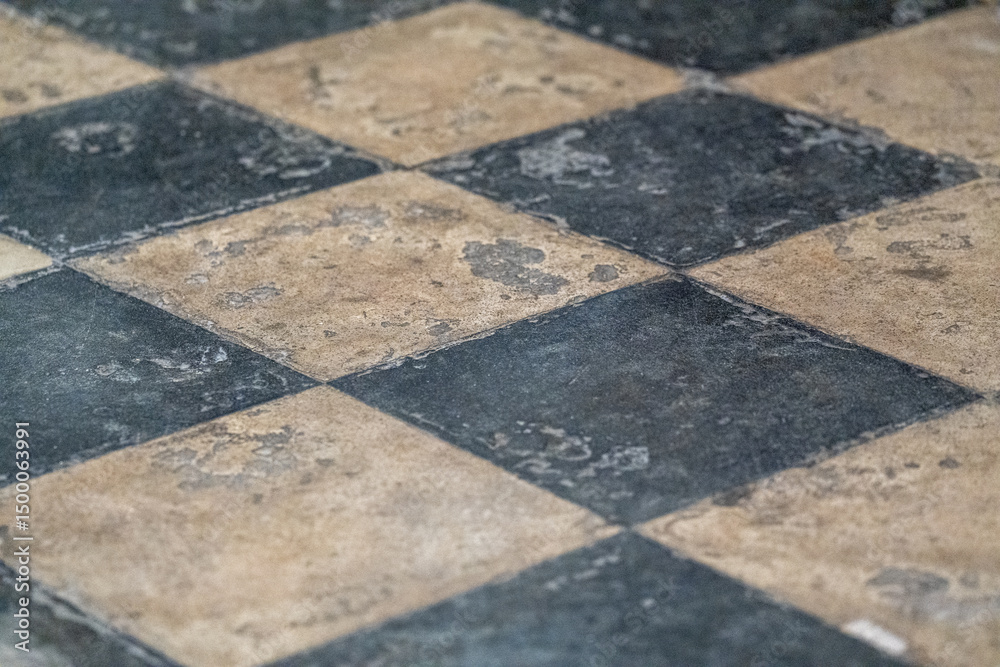 Obraz premium Black and white checkered tiles creating a classic geometric pattern