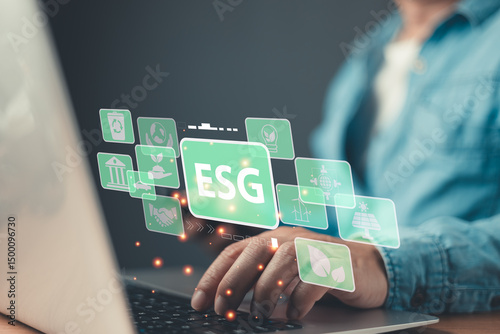 person types on a laptop with floating green icons representing ESG principles environmental, social, and governance highlighting sustainable practices, ethical standards, and responsible investment.