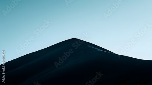 Majestic Mountain Peak Silhouette at Dawn