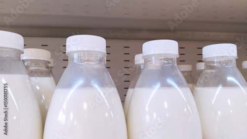 Plastic bottles. Supermarket shelf. Dairy products. Retail industry. Farmer market. Grocery store. Buying. Close up. Camel, cow, and goat milk. Packaging food. Business. Kefir. Yogurt. Inflation. B2B