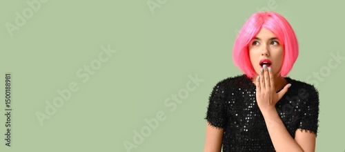 Portrait of shocked young w...