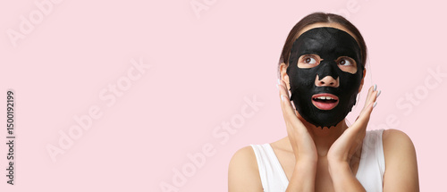 Surprised young woman with ...