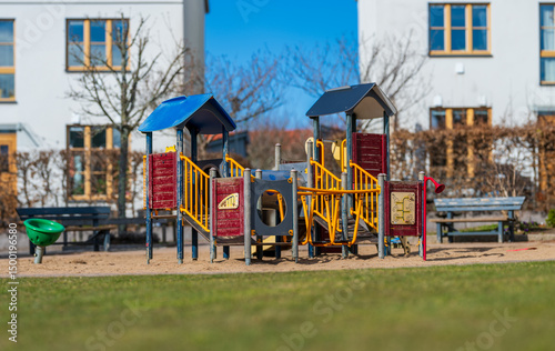 Colorful playground equipment in residential park.
