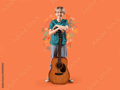 Cute little boy with guitar...