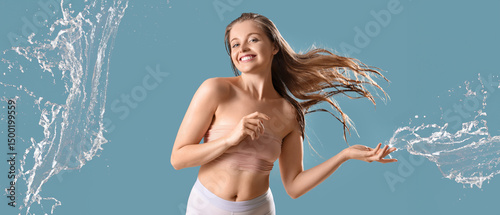 Happy young woman with spla...
