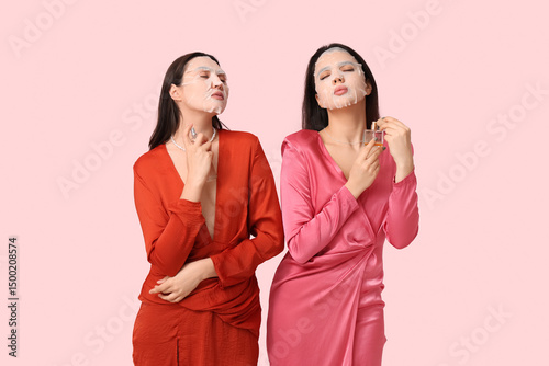 Young women in stylish dres...
