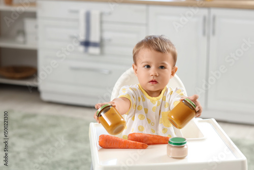Cute little baby with jars ...