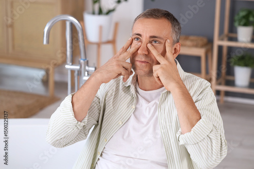 Mature man doing face build...