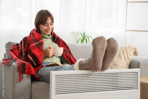 Young woman in warm socks w...