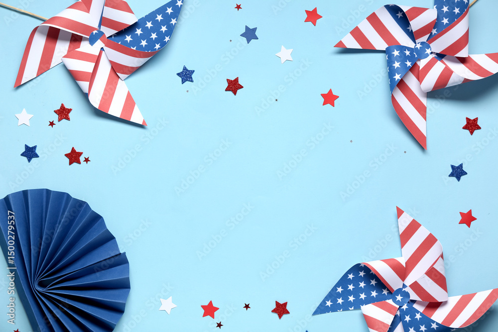 Fototapeta premium Pinwheels made of USA flags and stars on blue background. Independence Day celebration