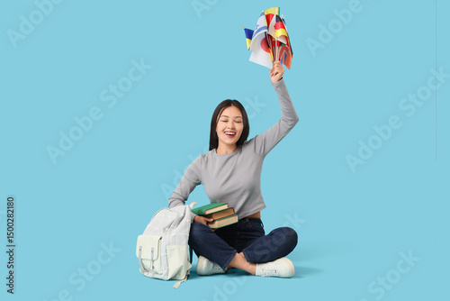 Female Asian student with f...