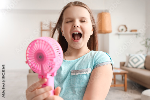 Cute girl with blowing mini...