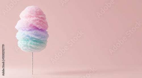 Colorful cotton candy on stick against soft pink background  