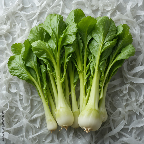 Fresh green choy sum on transparent background, ready for cooking