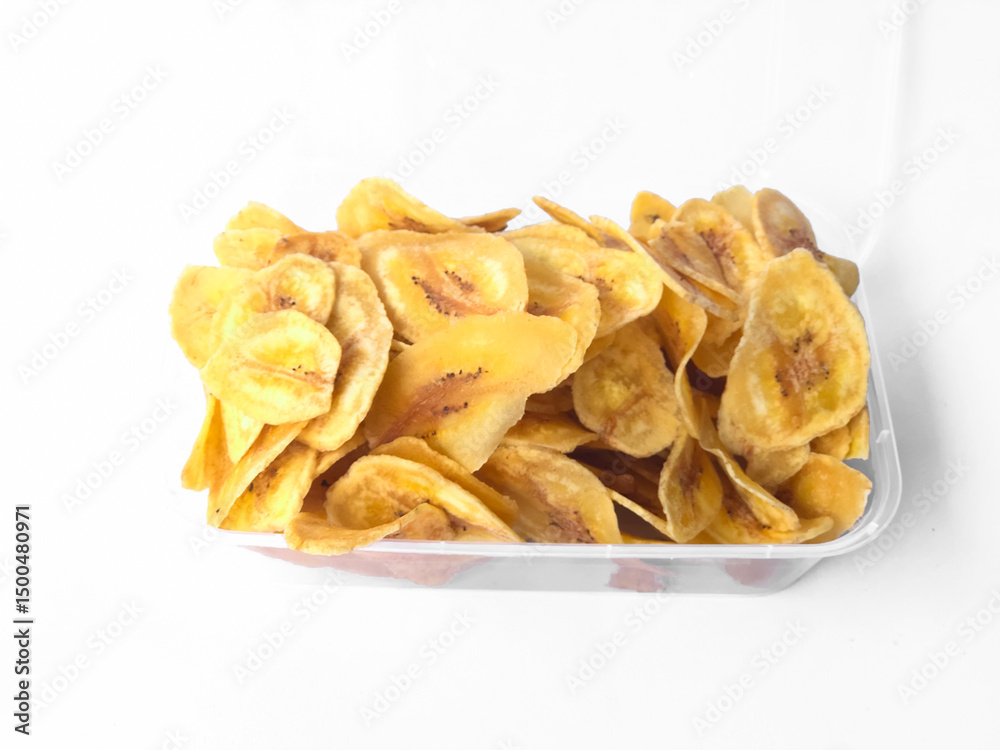 Banana chips sprinkled with white background isolation, banana chips made from musa paradisiaca bananas Banana chips sprinkled with white background isolation, banana chips made from musa paradisiaca bananas