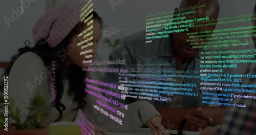 Colorful code drifting down revealing three software developers marking up diagrams while planning