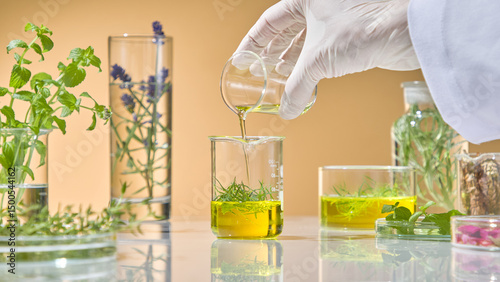 Fotografia Researcher pouring second layer of herbal extract into beaker for layered infusion test using natural ingredients