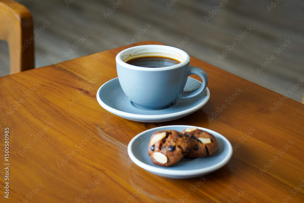 Obraz premium Hot Americano from Indonesia, captured on May 23, 2025. A rich espresso blend brewed with hot water, delivering bold flavor and a smooth finish with local coffee character