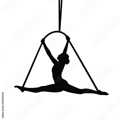 Silhouette of a woman performing aerial hoop acrobatics with legs split