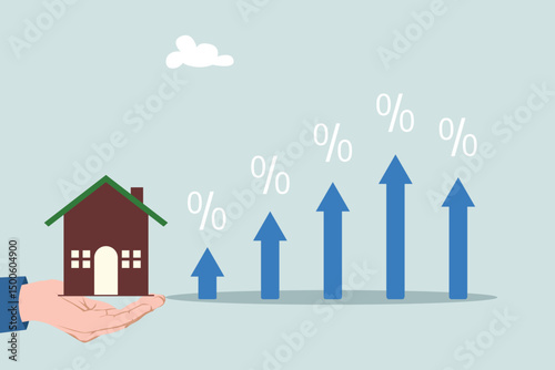 A businessman's hand holds a miniature wooden house, with an upward arrow with a percentage sign, the concept of mortgage interest rate growth and rising rent prices.
